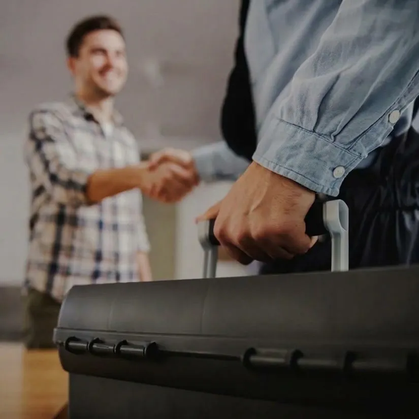 Visitor being greeted at a controlled office entrance