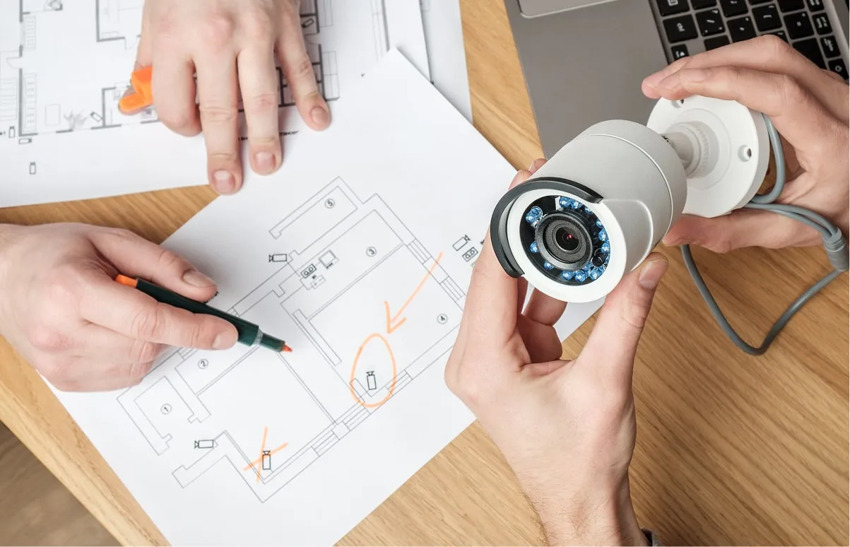 Dome security camera and tablet showing live camera views